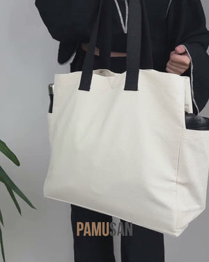 Shopper in cotone neutre 40 × 35 × 15 cm – due tasche laterali, manici neri intrecciati, soffietto completo da 15 cm – cotone 450 g/m²